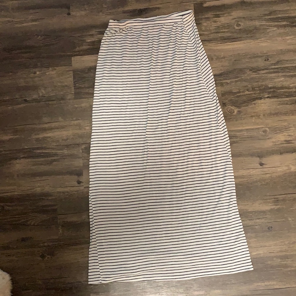White maxi skirt with black stripes.